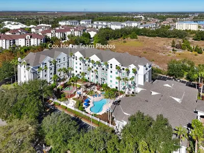 an aerial view of a resort with a pool at Disney 1st floorEpicShuttle in Orlando