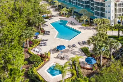 an overhead view of a pool at a resort at Stylish 2BR Retreat w Pool Sauna in Orlando