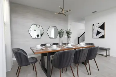 a dining room with a wooden table and chairs at Casa 5Q/5B c/ Piscina Perto da Disney in Kissimmee