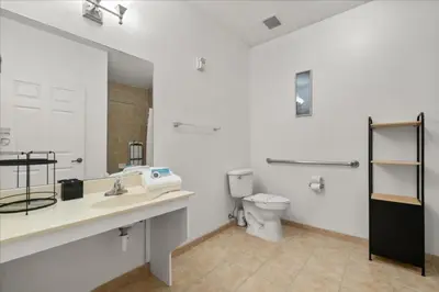 a bathroom with a sink and a toilet at 2 Bedrooms 2 Bathrooms Secret Lake 3176-204 in Kissimmee