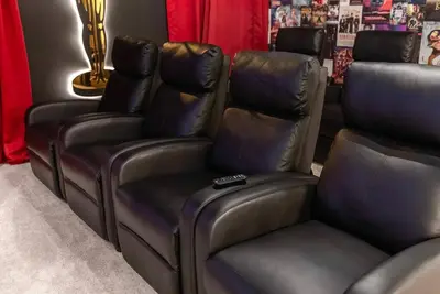 a group of leather chairs in a room at Brand NEW 12Bedrooms12Bathroom At Paradiso Grande in Orlando