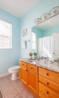 a bathroom with a sink and a toilet at Making Memories At Windsor Palms Resort, Great Amenities And Much More Fun! in Kissimmee