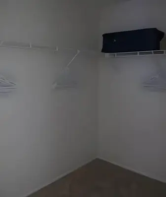a white room with a shelf on the wall at Premium Pool Villa Centrally Located near Disney in Kissimmee