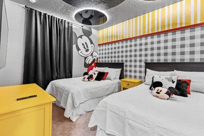 a bedroom with two beds with stuffed animals on them at NEW 4Bedrooms At LucayaClose to Disney in Kissimmee