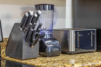 a blender sitting on top of a counter at Cozy Retreat-Heated Pool, Grill, Pickle Ball, Gym in Kissimmee
