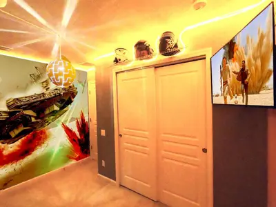a room with a white door and a painting on the wall at Windsor Hills Resort - Disney Dream Palace in Orlando