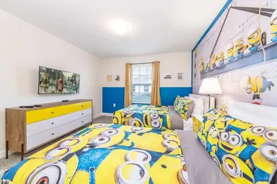 a bedroom with two beds and a dresser at 4827#2 Casa com Quartos Temáticos e Piscina Privativa in Kissimmee