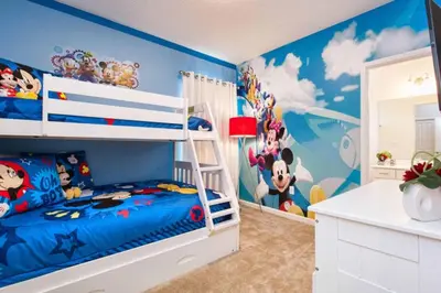 a bedroom with blue walls and a bunk bed at Sonoma - 6 Bedroom Pool Home- 1859Snr in Kissimmee