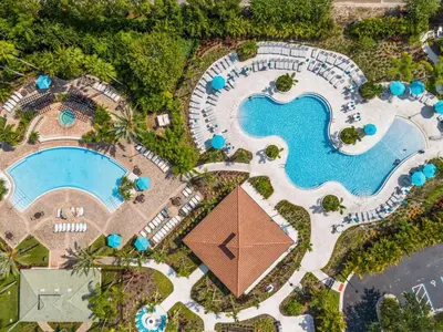 an overhead view of a pool at a resort at 3 Bedrooms 35 Bathrooms Vista Cay 4845-148 in Orlando
