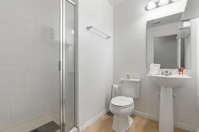 a bathroom with a toilet and a sink and a shower at Family House near Disney - 5109 in Kissimmee