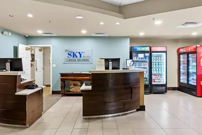 a view of a shop with a sky pharmacy at Hotel Room Next to Universal At Stay Sky Suites in Orlando