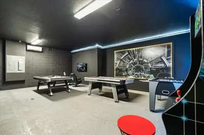 a gaming room with two ping pong tables in it at 15 Bedrooms155 Bathroomsveranda Palms 2477Rd in Kissimmee