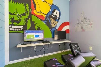 a room with a desk with a computer and a mural at Cozy 4BR Disney vacation Home7-104 in Kissimmee