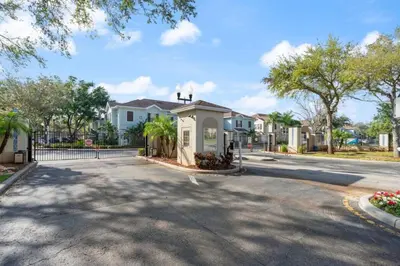 a street in a residential neighborhood with houses at Amazing 4bdr house in Disney 20104 in Kissimmee