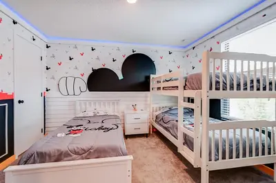 a childs bedroom with two bunk beds at 3417 Brand New 3BD Family Home Near Disney in Kissimmee