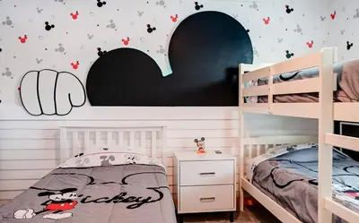 a childs bedroom with two bunk beds and hearts on the wall at 3417 Brand New 3BD Family Home Near Disney in Kissimmee