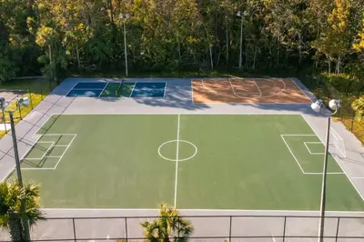 an aerial view of a tennis court at Luxury Studio Gem 10min to Disney Pool and Amenities in Kissimmee