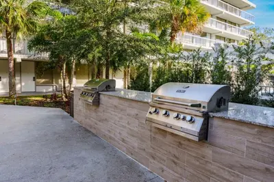 a grill on a wall in front of a building at Luxury and Cozy Gem 15min to Disney Free Parking in Kissimmee