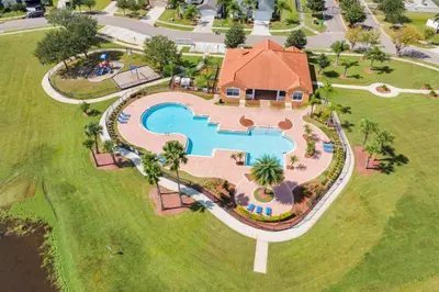 an aerial view of a house with a swimming pool at 4BDR with pool near Disney 1014 in Kissimmee