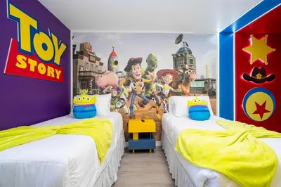 a bedroom with two beds in a toy story bedroom at Gorgeous 4Bd w Pool at Encantada Resort 8523 in Kissimmee