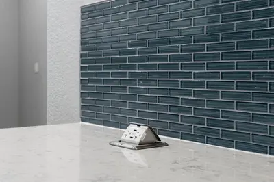 a toaster sitting on a counter in front of a brick wall at Finding Nemo House at Caribe Cove Resort - Sage Vacations in Kissimmee