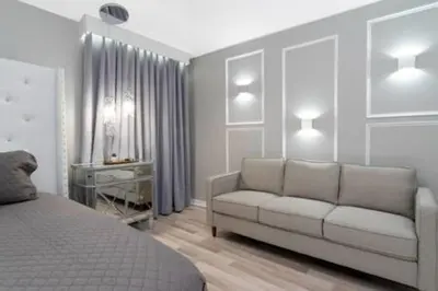 a living room with a bed and a couch at 4 Bedroom with Pool near to Disney in Kissimmee