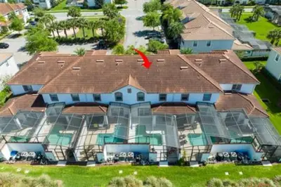 an aerial view of a large house with a roof at 4 Bedrooms3 Bathrooms at Storey Lake Resort in Kissimmee