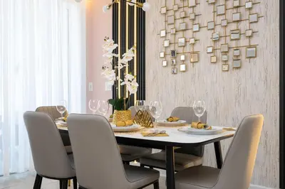 a dining room with a table with chairs and a chandelier at Magical Stay Mickey and Harry Potter Rooms in Kissimmee