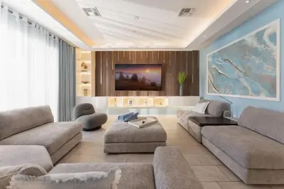 a living room with two couches and a tv at 2817 Storey Lake Kissimmee in Kissimmee
