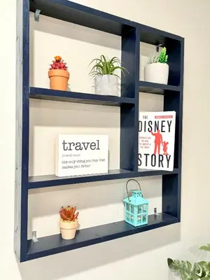 a shelf with potted plants on it at Boho retreat close to Disney! in Kissimmee