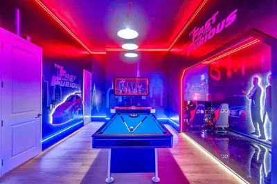 a ping pong table in a room with red lights at 15 Bedrooms 165 Bathrooms Sonoma 4081 Sb in Kissimmee