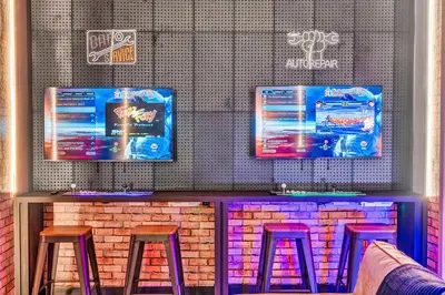 a bar with three stools on a brick wall at 15 Bedrooms 165 Bathrooms Sonoma 4081 Sb in Kissimmee