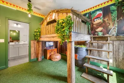 a play room with a tree house and a bathroom at 15 Bedrooms 165 Bathrooms Sonoma 4171Sb in Kissimmee