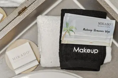 a box filled with towels and a box of matches at Family Escape Near Disney Serene Retreat in Terra Verde Resort in Kissimmee