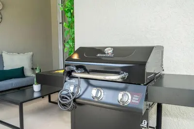 a grill sitting on top of a table at Stylish Home & Free Resort Access 2420 in Kissimmee