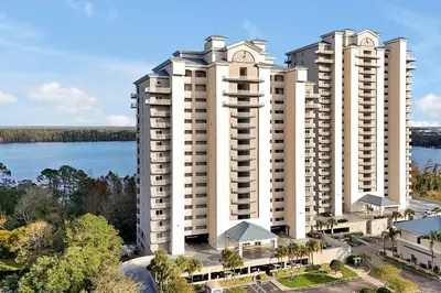 an aerial view of two large white apartment buildings at Luxurious Condo near DisneyLand in Orlando