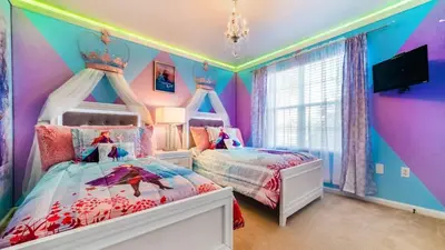 a childs bedroom with two beds and a princess ceiling at MNL2696 in Orlando