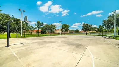 an empty basketball court in a park at MSW2537 in Orlando