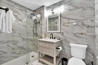 a bathroom with a shower and a sink and a toilet at AF2574 - Windsor Hills Resort Vacation Home in Orlando