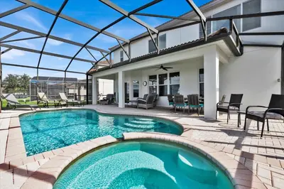 a swimming pool in a house with a glass roof at AF2574 - Windsor Hills Resort Vacation Home in Orlando