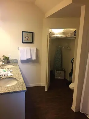 a bathroom with a sink and a toilet at 3BR Townhome West Lucaya Resort Close to Disney in Kissimmee