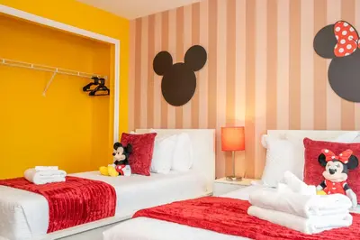 a bedroom with two beds with stuffed animals on them at Beautiful 4 BR close to Disney in Kissimmee
