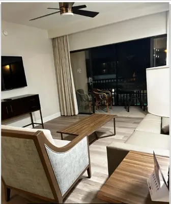 a living room with a couch and a table at Westgate Towers in Orlando