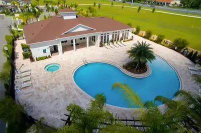 an aerial view of a house with a swimming pool at Amzing location 3BDR House - 8980 in Kissimmee