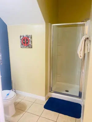a bathroom with a shower and a toilet at Paraíso Magico Getaway 5152 in Kissimmee