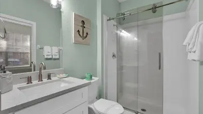 a bathroom with a shower and a sink and a toilet at SKC7679 Windsor Hills Resort Vacation Townhome - includes resort clubhouse amenity access in Orlando