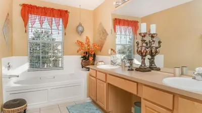 a bathroom with a tub and a sink at MNL2696 Windsor Hills Resort Vacation Home - includes resort clubhouse amenity access in Orlando