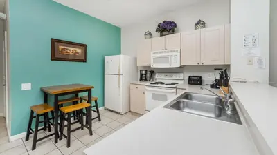 a kitchen with a sink and a counter top at PP8114 Windsor Palms Resort Vacation Townhome in Kissimmee