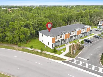 an overhead view of a building with a red marker at 8740 Enchanted Stay near Disney in Kissimmee