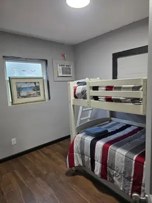 a bedroom with a bunk bed in a room at Epic Universal park neigbour 1500 feet in Orlando